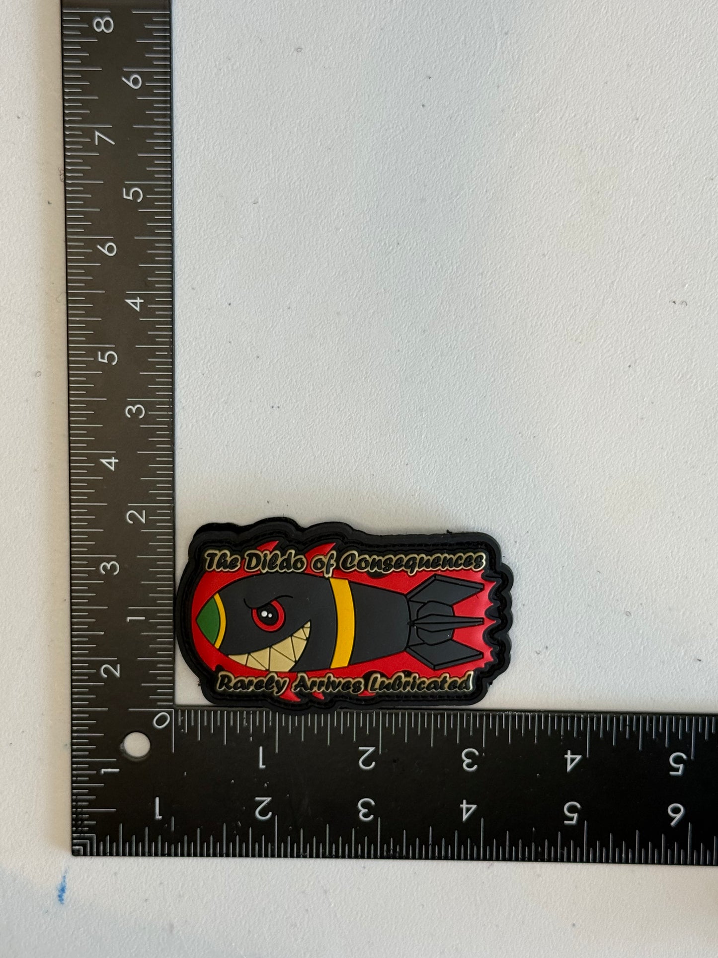 The Dildo of Consequences — Rarely Arrives Lubricated PVC Patch